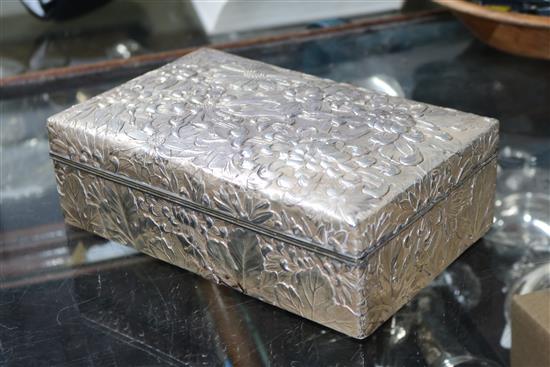 An early 20th century Japanese white metal, jungin mark, cigar/cigarette box, 24.5cm.